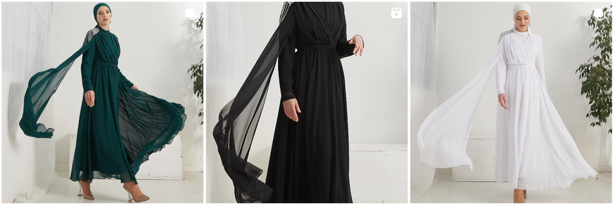 Una donna che indossa tre ariosi abaya all'ingrosso.