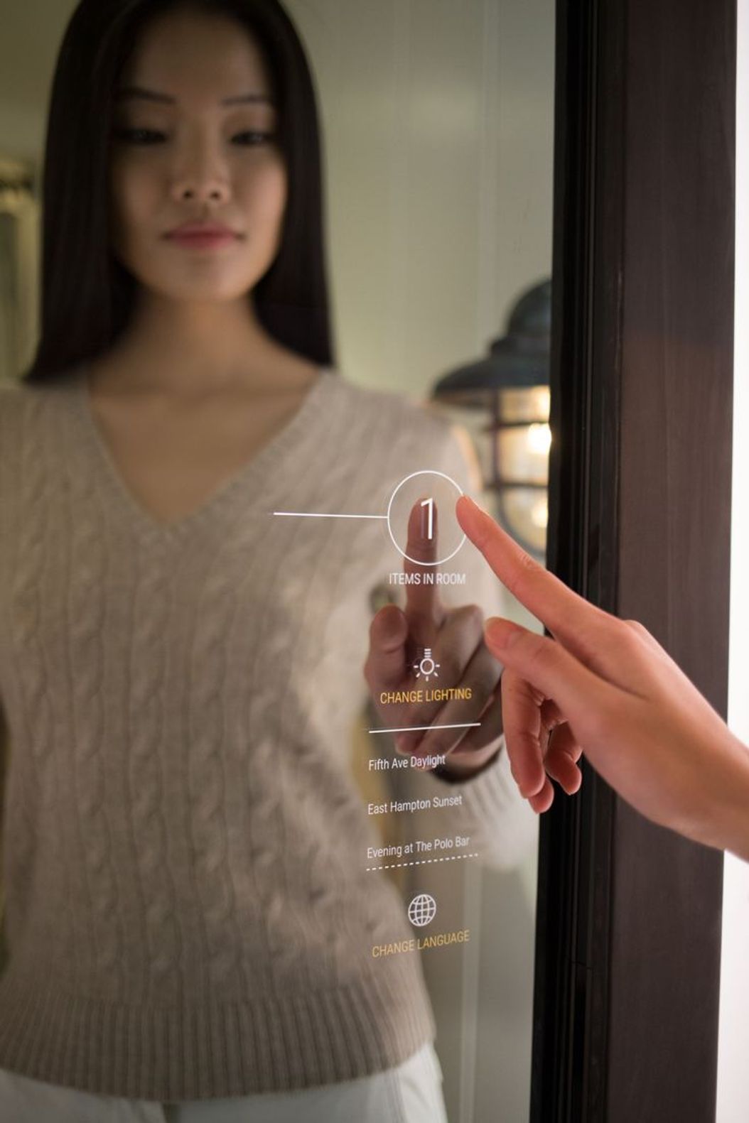 A modern boutique interior design offering an interactive fitting room mirror to view product information