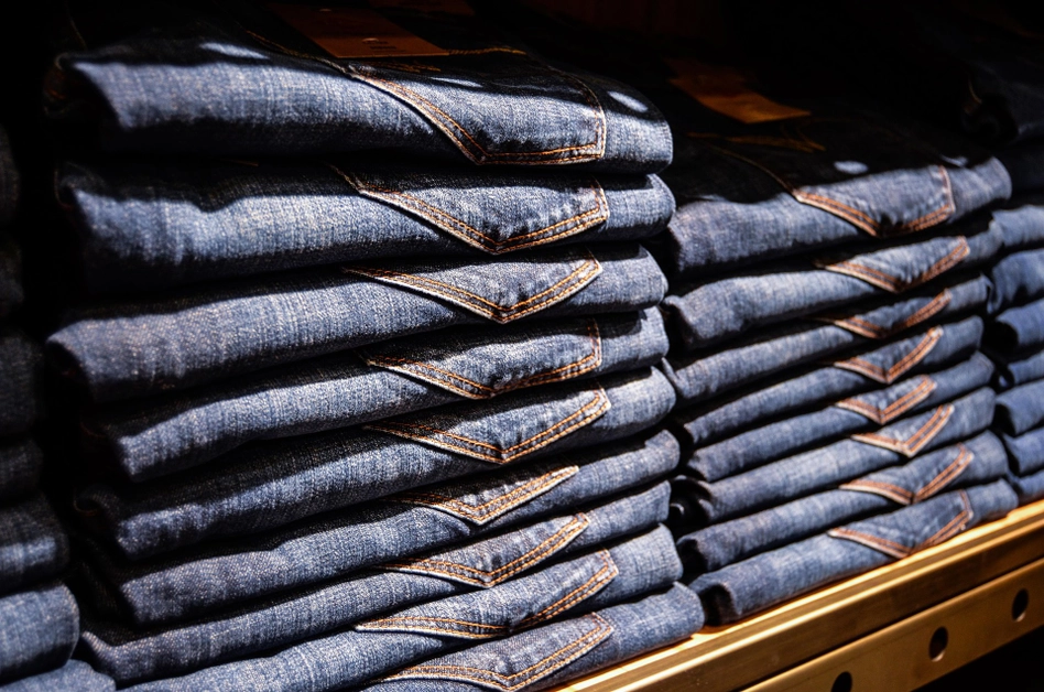 A pack of jeans on a shelf