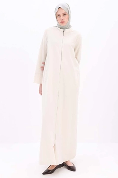 A wholesale clothing model wears all12803-stone-zippered-comfortable-fit-abaya-stone, Turkish wholesale Abaya of Allday