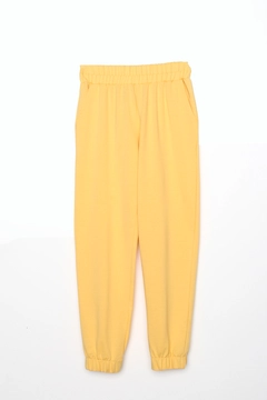 A wholesale clothing model wears all12841-light-jogger-sweatpants-yellow, Turkish wholesale Sweatpants of Allday