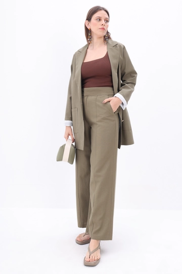 A wholesale clothing model wears  Chestnut Linen Trousers - Khaki
, Turkish wholesale Pants of Allday