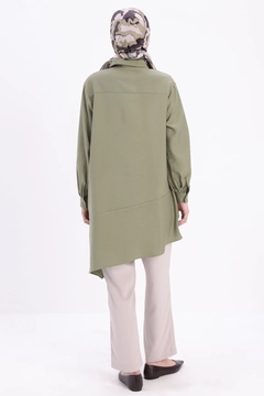 A wholesale clothing model wears all12922-open-asymmetrical-slit-tunic-green, Turkish wholesale Tunic of Allday