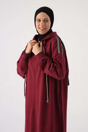 A model wears 47110 - Abaya - Dark Claret Red, wholesale undefined of Allday to display at Lonca