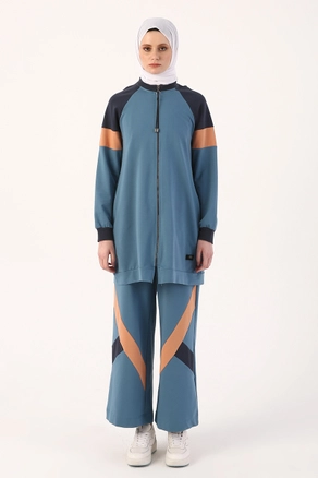 A model wears 7140 - Blue Sweatsuit, wholesale undefined of Allday to display at Lonca