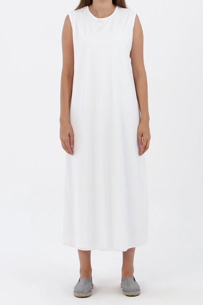 A model wears 7439 - Sleeveless Long Dress Lining - White, wholesale Skirt of Allday to display at Lonca