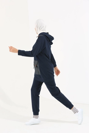 A model wears 8843 - Modest Tracksuit - Indigo, wholesale Tracksuit of Allday to display at Lonca
