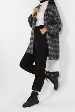 A model wears 8881 - Modest Tartan Jacket - Black, wholesale undefined of Allday to display at Lonca