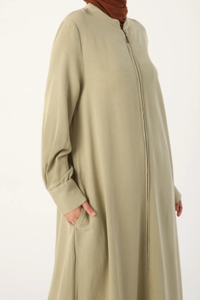 A model wears 16300 - Abaya - Green, wholesale undefined of Allday to display at Lonca
