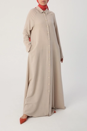 A model wears 22012 - Abaya - Beige, wholesale Abaya of Allday to display at Lonca