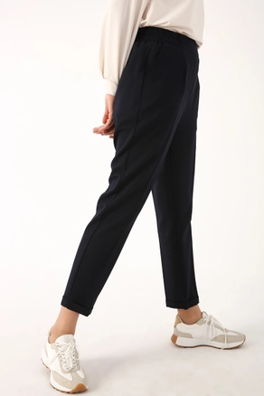 A model wears 30851 - Pants - Navy Blue, wholesale undefined of Allday to display at Lonca