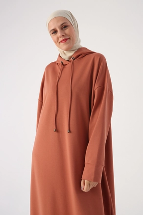 A model wears 33565 - Dress - Cinnamon, wholesale undefined of Allday to display at Lonca