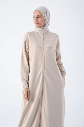 A model wears ALL10440 - Abaya - Beige, wholesale Abaya of Allday to display at Lonca