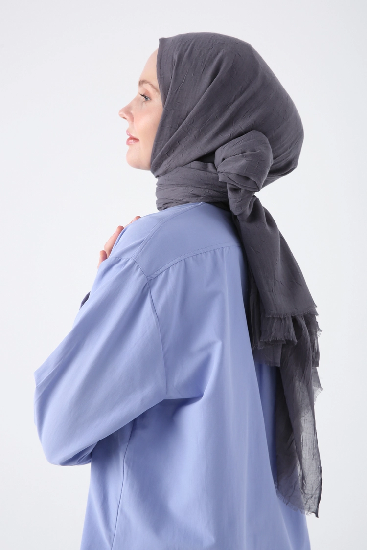 A model wears ALL10711 - Bamboo Knee Shawl - Gray, wholesale Shawl of Allday to display at Lonca