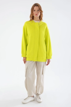 A wholesale clothing model wears all11731-neon-shoulder-flounce-hooded-cardigan-yellow, Turkish wholesale Cardigan of Allday