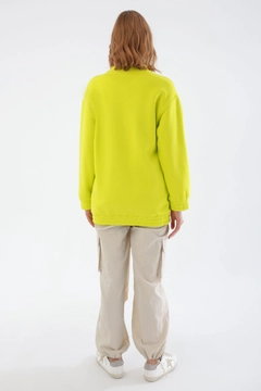 A wholesale clothing model wears all11731-neon-shoulder-flounce-hooded-cardigan-yellow, Turkish wholesale Cardigan of Allday