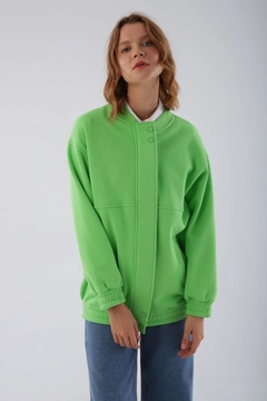 A wholesale clothing model wears all11749-neon-shoulder-flounce-hooded-cardigan-green, Turkish wholesale Cardigan of Allday