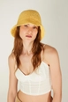 A wholesale clothing model wears axs11639-hand-knitted-straw-hat-yellow, Turkish wholesale  of 
