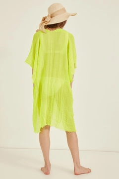 A wholesale clothing model wears axs10030-neon-pareo-green, Turkish wholesale Pareo of Axesoire