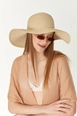 A wholesale clothing model wears axs10451-wide-straw-hat-beige, Turkish wholesale  of 