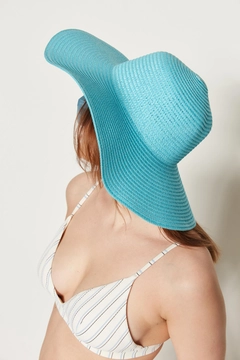 A wholesale clothing model wears axs10457-wide-straw-hat-turquoise, Turkish wholesale Hat of Axesoire