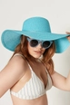 A wholesale clothing model wears axs10457-wide-straw-hat-turquoise, Turkish wholesale  of 