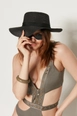 A wholesale clothing model wears axs10426-wide-straw-hat-black, Turkish wholesale  of 