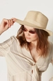 A wholesale clothing model wears axs10827-wide-straw-hat-beige, Turkish wholesale  of 
