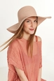 A wholesale clothing model wears axs11218-powder-wide-straw-hat, Turkish wholesale  of 