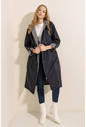 A model wears 6330 - Black Trenchcoat, wholesale undefined of Big Merter to display at Lonca