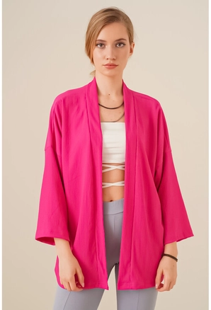 A model wears 17375 - Kimono - Fuchsia, wholesale undefined of Big Dart to display at Lonca