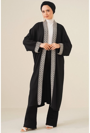 A model wears 17377 - Kimono - Black, wholesale undefined of Big Dart to display at Lonca