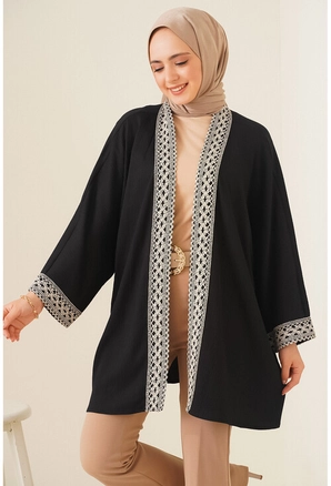 A model wears 21934 - Kimono - Black, wholesale undefined of Big Dart to display at Lonca