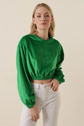A model wears 46778 - Crop Blouse - Green, wholesale Blouse of Bigdart to display at Lonca