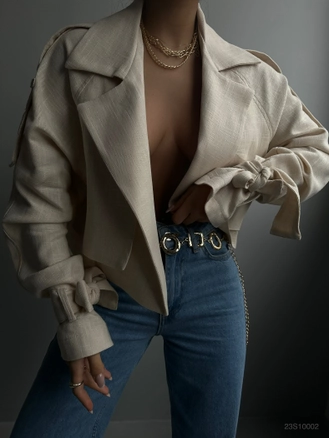 A model wears BLA10245 - Crop Trench Coat - Stone, wholesale undefined of Black Fashion to display at Lonca