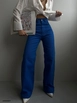 Bir model,  toptan giyim markasının bla10243-jeans-sax toptan  ürününü sergiliyor.