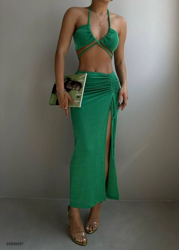 A wholesale clothing model wears  Lace-Up Crop Pleated Skirt Suit - Green
, Turkish wholesale Suit of Black Fashion