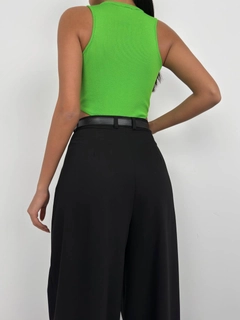 A wholesale clothing model wears bla11441-window-detail-swimming-bodysuit-lime, Turkish wholesale Bodysuit of Black Fashion