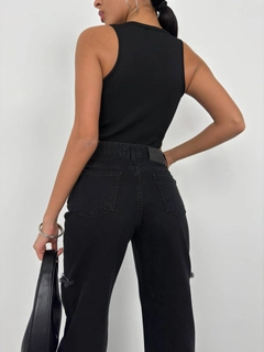 A wholesale clothing model wears bla11442-window-detail-swimmer-bodysuit-black, Turkish wholesale Bodysuit of Black Fashion