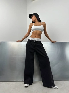 A wholesale clothing model wears bla11490-elastic-boxer-low-waist-jean-double-set-snow-wash-smoked, Turkish wholesale Jeans of Black Fashion
