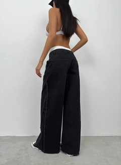 A wholesale clothing model wears bla11490-elastic-boxer-low-waist-jean-double-set-snow-wash-smoked, Turkish wholesale Jeans of Black Fashion