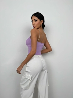 A wholesale clothing model wears bla11502-stone-strap-knitted-blouse-lilac, Turkish wholesale Crop Top of Black Fashion