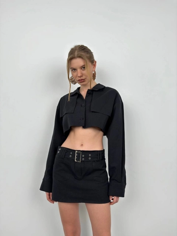 A wholesale clothing model wears  Belt Detail Mini Skirt - Black
, Turkish wholesale Skirt of Black Fashion
