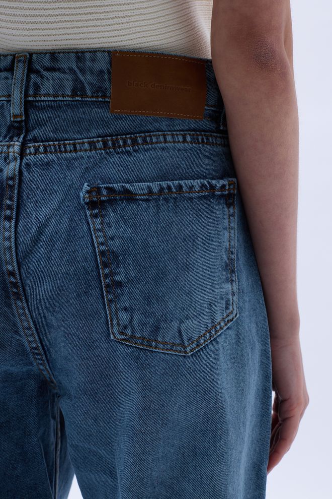 Black Fashion Vaqueros Láser Asimétricos Rasgados Azul Ropa al por mayor Ropa de calle