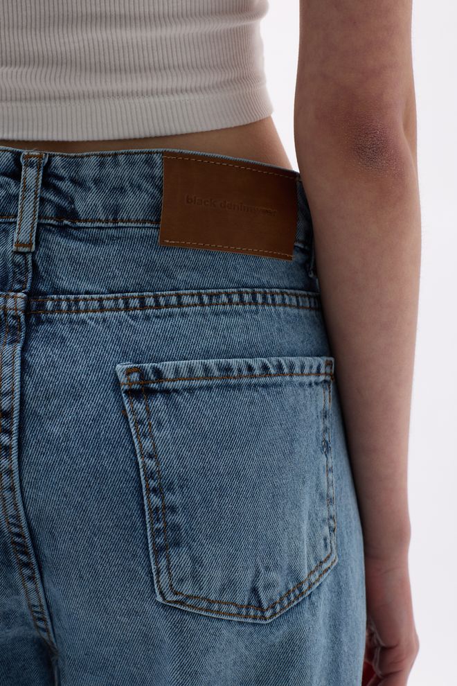 Black Fashion Ripped Asymmetric Laser Jeans Light Blue Wholesale Clothing Streetwear