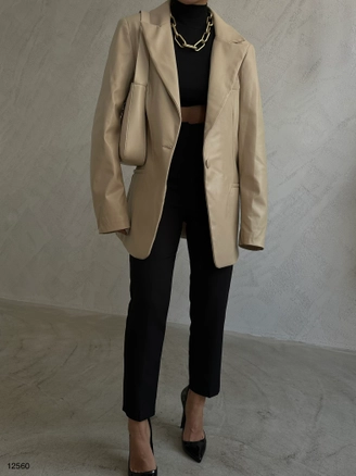 A model wears 37846 - Jacket - Beige, wholesale Jacket of Black Fashion to display at Lonca