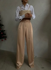 A model wears 38541 - Pants - Beige, wholesale undefined of Black Fashion to display at Lonca