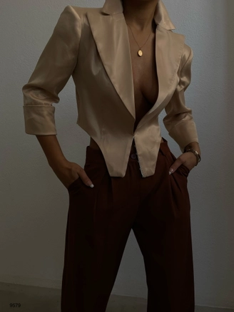 A model wears 38865 - Jacket - Beige, wholesale Jacket of Black Fashion to display at Lonca