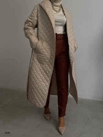 A model wears 38198 - Trenchcoat - Beige, wholesale undefined of Black Fashion to display at Lonca