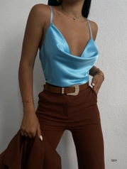 A model wears 38346 - Blouse - Blue, wholesale undefined of Black Fashion to display at Lonca